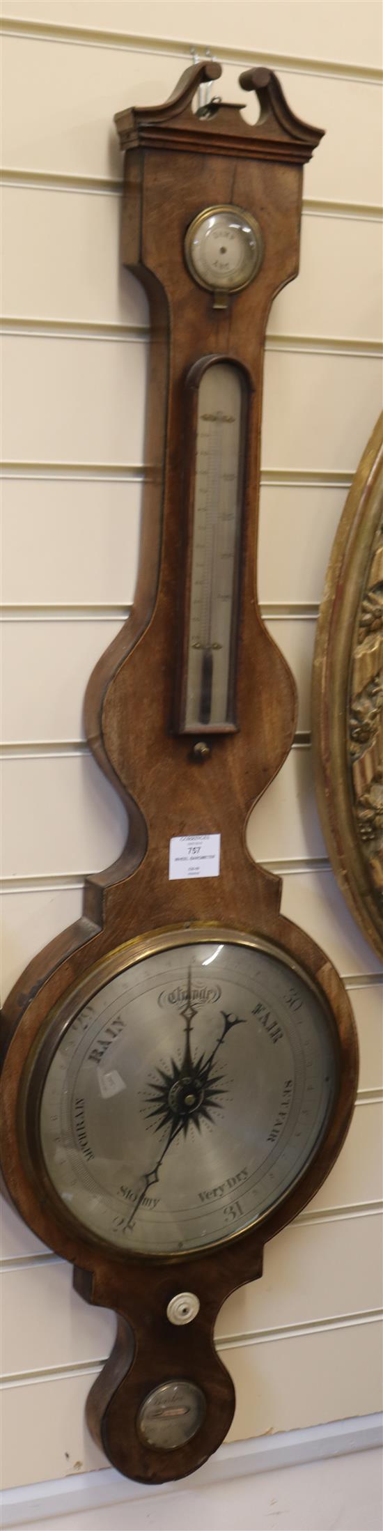 Burton of Lewisham. A Regency inlaid mahogany wheel barometer W.31cm